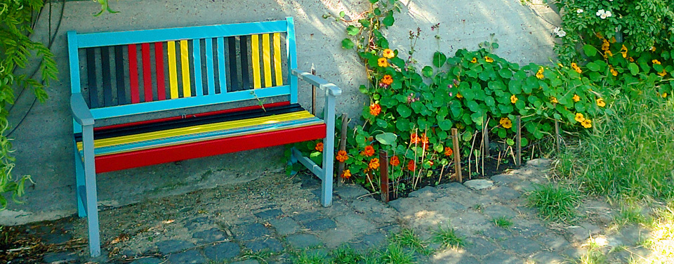 pavement garden in Amsterdam with coloured seat